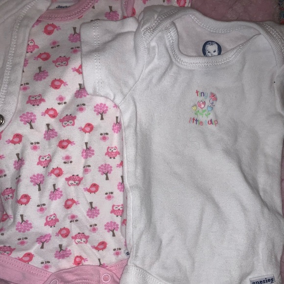 Baby sleepers and onsies. Sizes range from newborn - Picture 7 of 7
